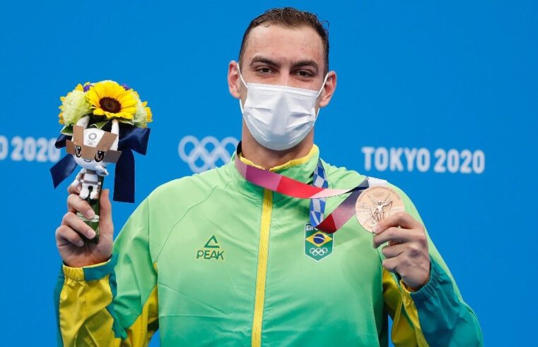 Treino em açude e medalha para o Brasil